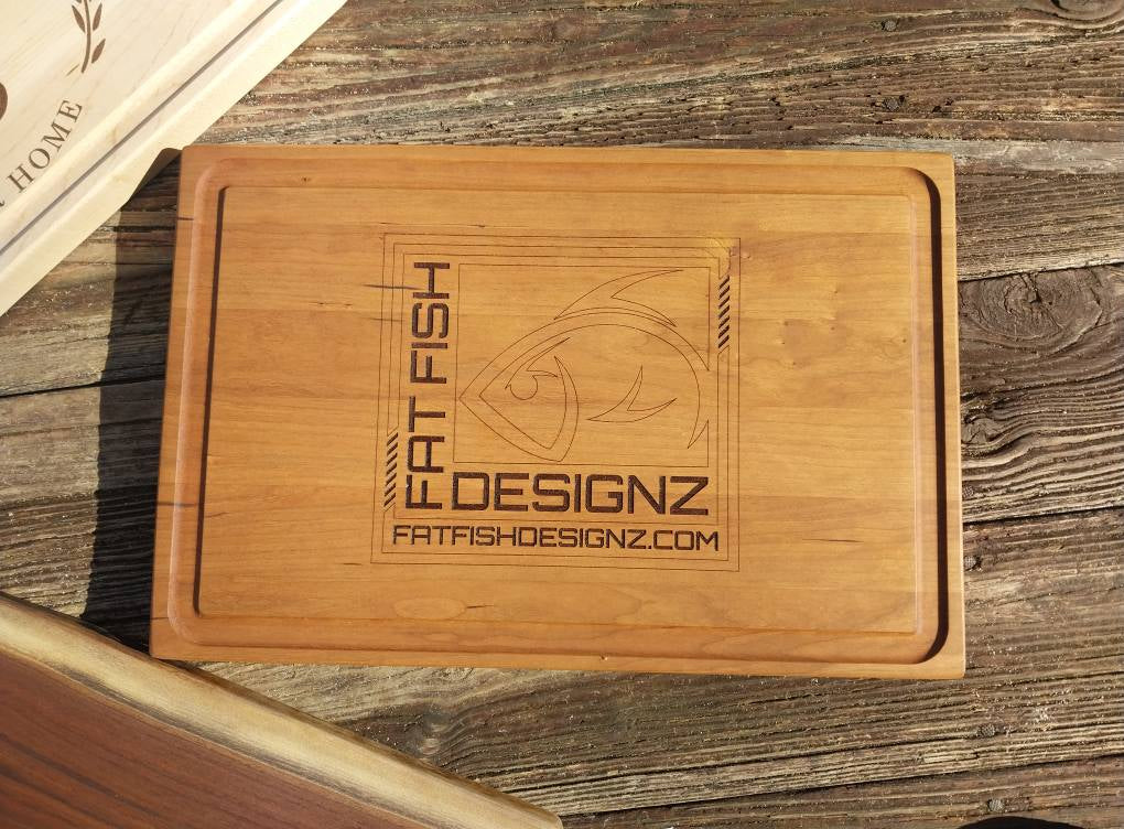 wood cutting board , cherry wood, custom laser engraved logo